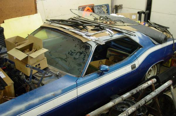 The blue 72 cuda 340 is my own Cars in Barns Car